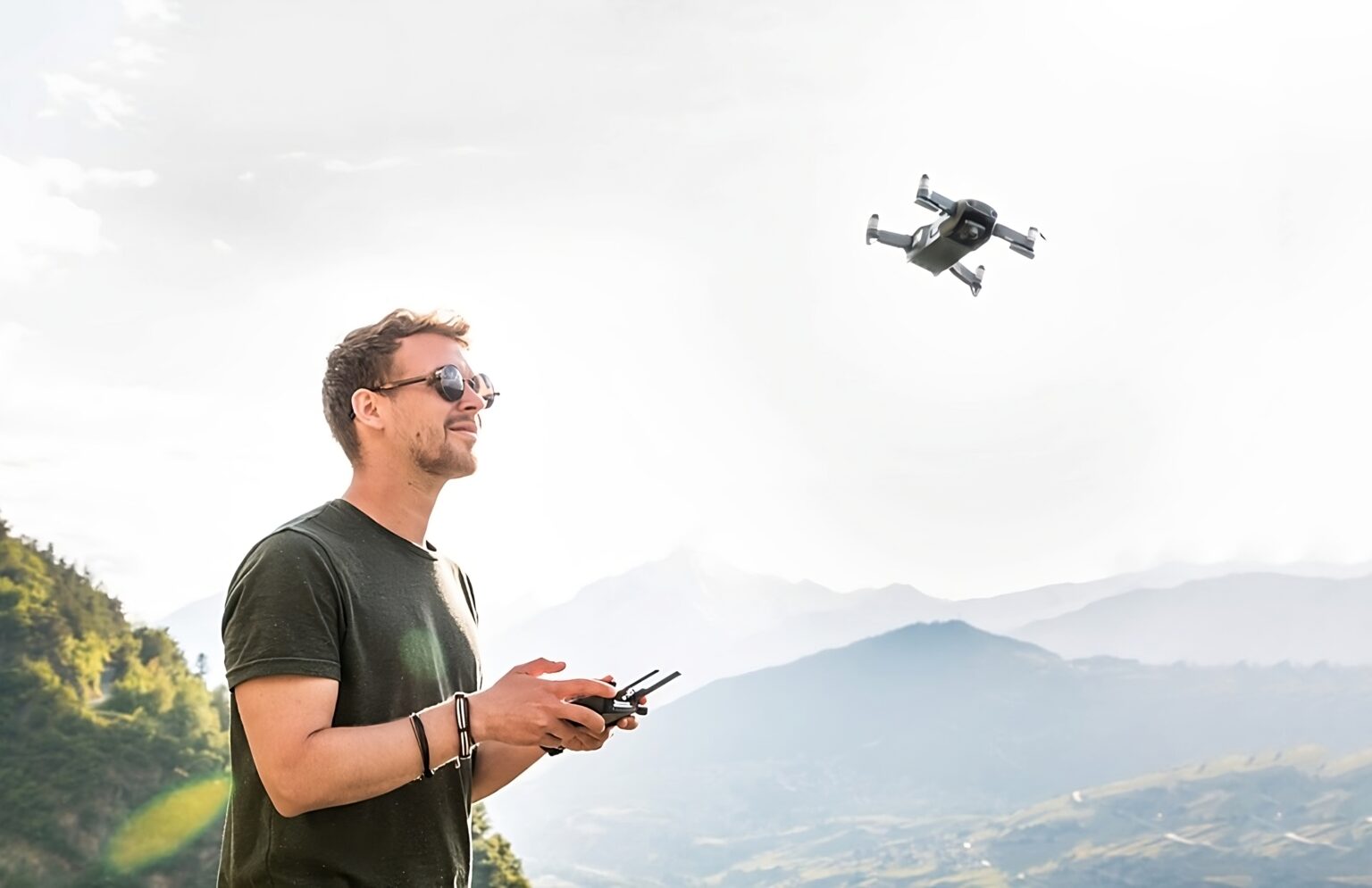 Photographer flying a drone for aerial photography
